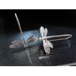 Silver pair of earrings in the form of dragonfly drop earrings