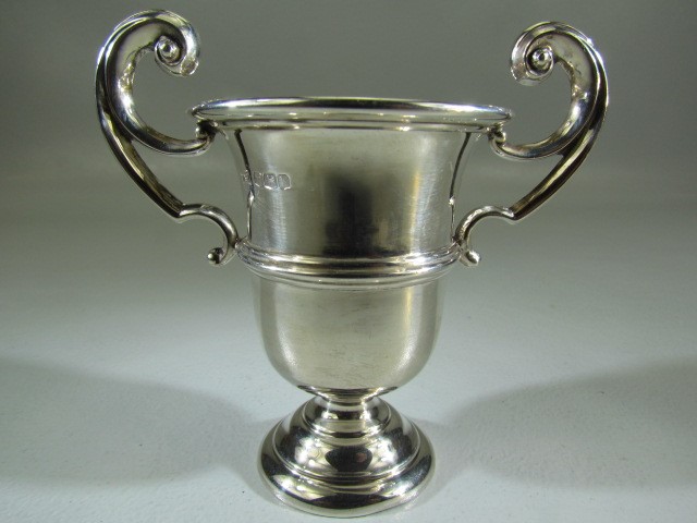 Hallmarked silver trophy with two handles - 53.9g along with a silver topped relish jar Henry - Image 4 of 5