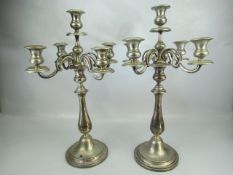 Ornate pair of silver plated candelabra