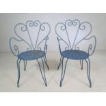 French pair of metal bistro chairs