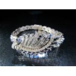 18ct Art Deco Sapphire and Diamond bangle. Approx weight 28.8g