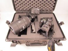 Nikon D50 camera with SIGMA EX lens in hard travel case with a Canon G16 digital camera and a