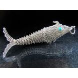Articulated silver fish with turquoise eye. Approx weight - 10.3g