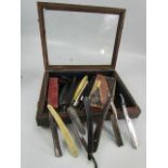 Wooden & Glass presentation case containing approx fifteen various cut throat razors