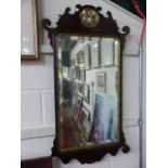 Antique mahogany mirror with central pierced work top (Gilded) surrounding a bevel mirror