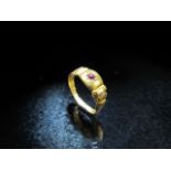 15ct Gypsy style gold ring set with ruby and two diamond studs. 1.2g A/F