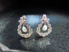 Silver and opal pair of panelled earrings