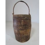 Metal and wooden antique hanging grain bucket