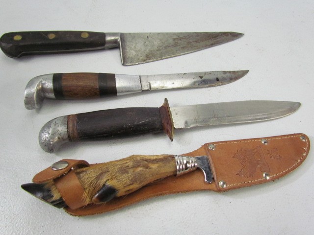 Selection of four hunting knives to include a deers hoof