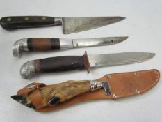 Selection of four hunting knives to include a deers hoof