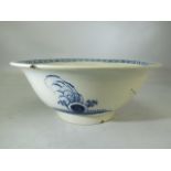 Pearlware bowl of large form painted in Underglaze blue with fence pattern rim. Decorated to outside