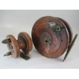 Two vintage wooden fishing reels