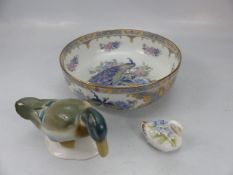 Oriental style bowl decorated with birds and flowers along with a Royal Doulton duck and one other