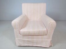 Pink striped upholstered chair