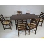 Darkwood Ercol dining table and darkwood chairs