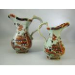 Celadon pair of graduating jugs