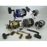 Five fishing reels - Shakespeare Xcede, Okuma Classic Pro XT, Abu Garcia Seven, Akios S-Line