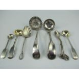 Selection of Tea strainers and condiment spoons - some silver