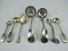 Selection of Tea strainers and condiment spoons - some silver