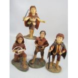 Lord of the Rings Collectables - Four unmarked figures of the hobbits.