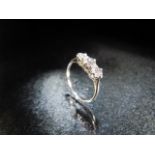 18ct White Gold three stone diamond ring of approx .65pts