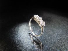 18ct White Gold three stone diamond ring of approx .65pts