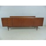 Mid Century Teak side board with cupboards and drawers