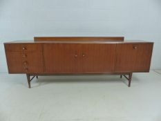 Mid Century Teak side board with cupboards and drawers