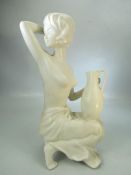 Blanc de Chine Art deco pottery figure of a lady and water jug - unmarked