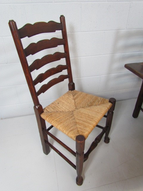 Antique oak dining table with matching rush seated chairs - Image 5 of 5
