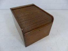 Mid century oak box with tamber roller front - key in office