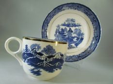 Antique blue and white tea cup and saucer