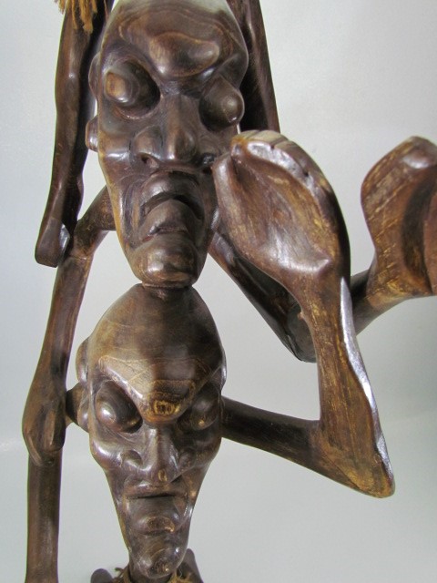 Carved African/Indonesian figure of two stick man upon the shoulders of each other - Image 3 of 3