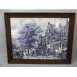 Delft framed tiles depicting a street scene