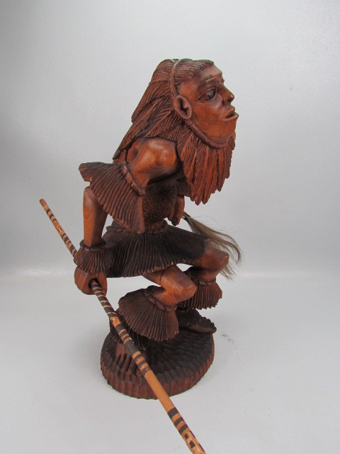 Indonesian style carved wooden figure of a warrior man in full dress - Image 3 of 6