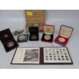 Large selection of commemorative coins and loose crowns along with a boxed set of gemstones.