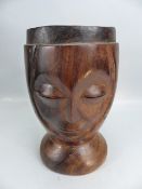 Carved African bowl depicting a mans face