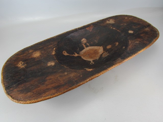 Vintage African wooden trug with lacework design