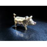Brass vesta case in the form of a pig