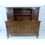 Greenman oak carved dresser with three long drawers over three cupboards