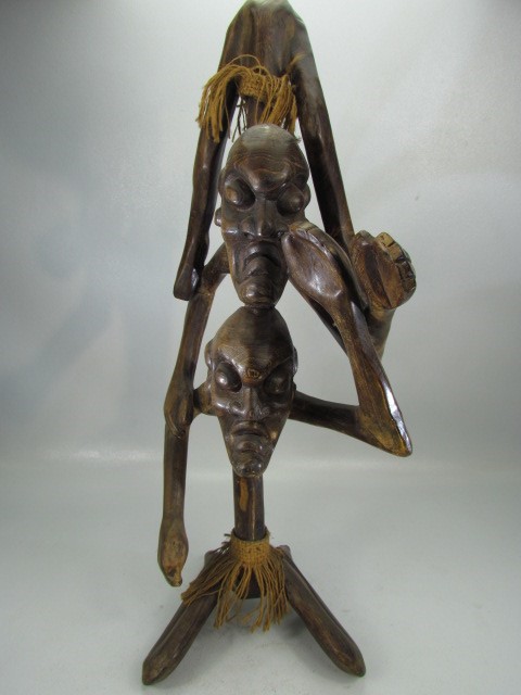 Carved African/Indonesian figure of two stick man upon the shoulders of each other - Image 2 of 3