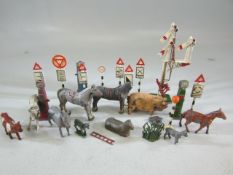 Small selection of Britains farm animals and railway signals