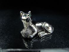 Sterling silver figure of a cat set with green stone