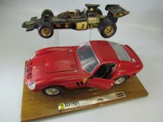 Burago mounted Ferrari 250 GTO (1962) on wooden plinth along with a Corgi racing car