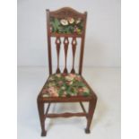 Floral upholstered vintage chair