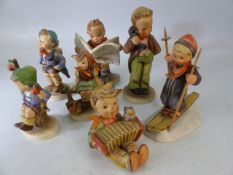 Seven West German Goebel Hummel figures. All marked.