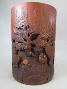 Antique chinese brush pot with carved decoration to front.