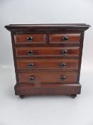 Antique Apprentice chest of drawers in mahogany with turned wooden handles