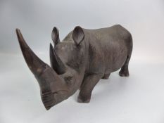 Carved wooden african figure of a Rhinoceros
