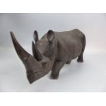 Carved wooden african figure of a Rhinoceros